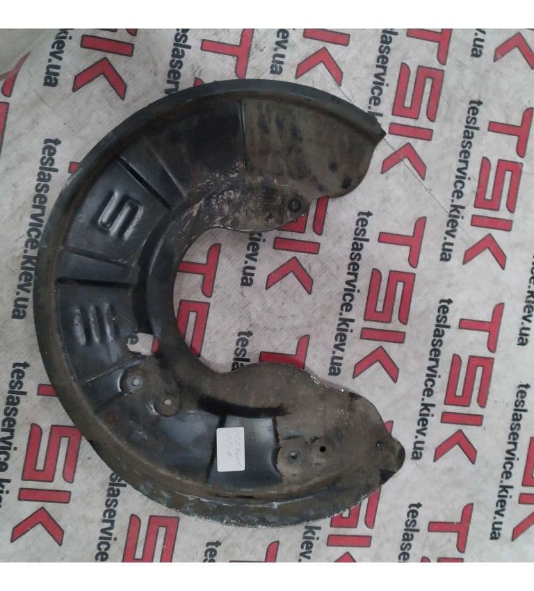 Термозащита передняя левая тормозного диска {MS_MSR_MX}, Tesla Model S (OEM 1027661-01-B)